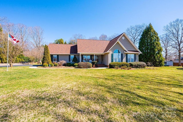 view of front facade featuring a front yard