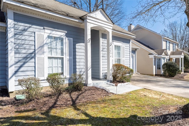 exterior space featuring driveway