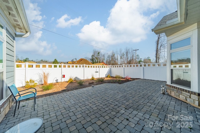 view of patio with a fenced backyard