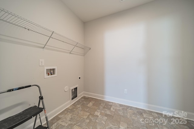 washroom with washer hookup, laundry area, baseboards, and electric dryer hookup