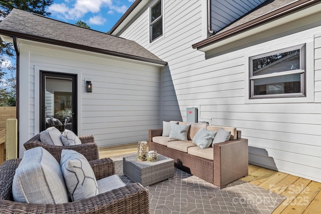 wooden terrace featuring outdoor lounge area