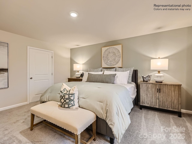 bedroom featuring carpet flooring and baseboards