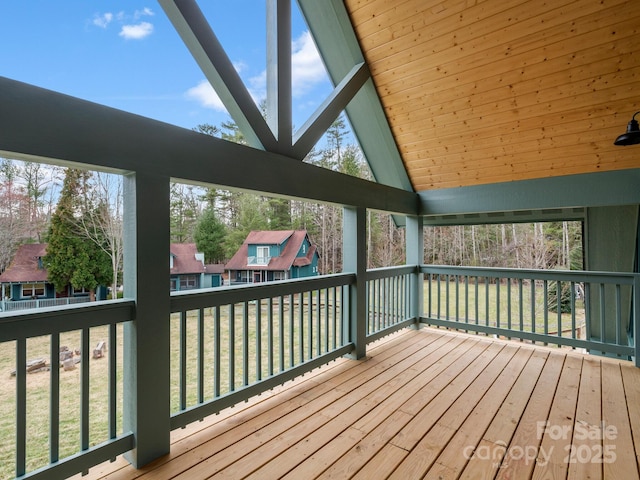 unfurnished sunroom with vaulted ceiling