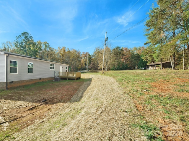 view of yard featuring a deck