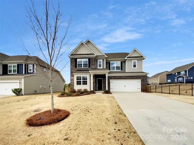 view of front facade featuring fence, driveway, brick siding, a garage, and board and batten siding