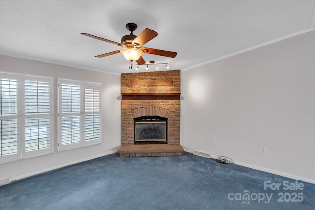 unfurnished living room featuring a ceiling fan, visible vents, carpet floors, and ornamental molding