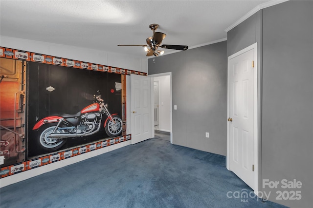 unfurnished bedroom featuring carpet flooring, crown molding, and ceiling fan