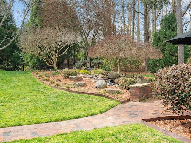 view of yard with fence