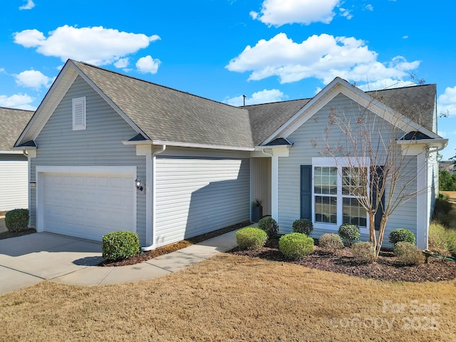 ranch-style house with a front lawn, concrete driveway, and roof with shingles