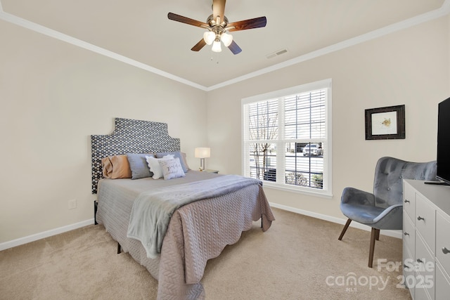 bedroom featuring crown molding, baseboards, visible vents, and light carpet