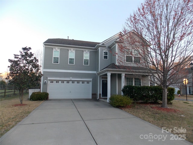 3500 Exbury Gardens Dr, Waxhaw, NC 28173 - traditional home featuring concrete driveway, a front lawn, fence, and an attached garage