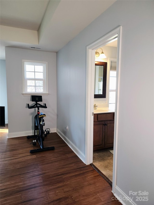 3500 Exbury Gardens Dr, Waxhaw, NC 28173 - exercise area with baseboards, dark wood-style flooring, and visible vents