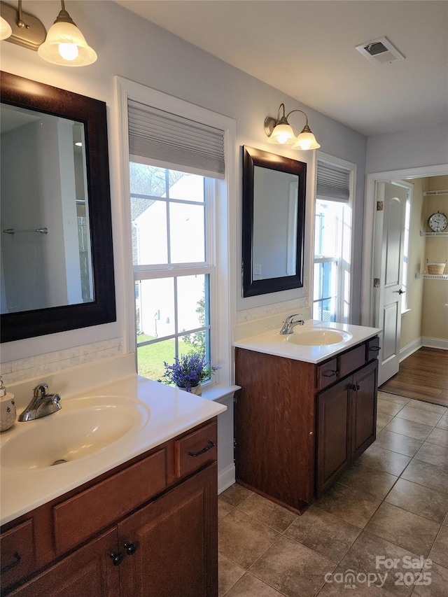 3500 Exbury Gardens Dr, Waxhaw, NC 28173 - full bathroom featuring a sink, two vanities, and visible vents