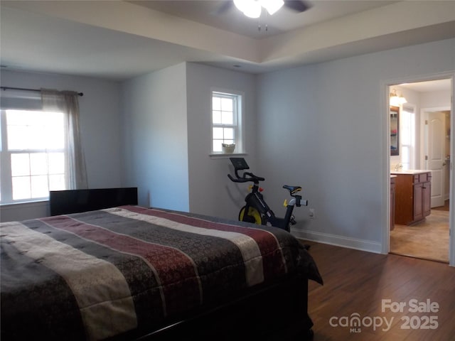 3500 Exbury Gardens Dr, Waxhaw, NC 28173 - bedroom with baseboards, wood finished floors, and a sink