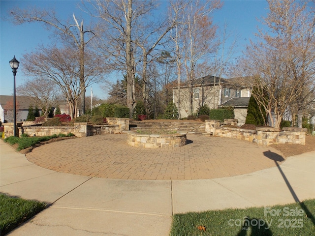 3500 Exbury Gardens Dr, Waxhaw, NC 28173 - exterior space with an outdoor fire pit and a patio area