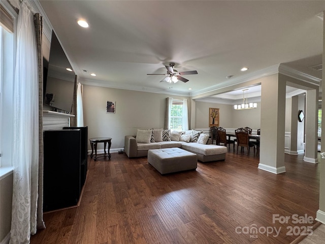3500 Exbury Gardens Dr, Waxhaw, NC 28173 - living room with a ceiling fan, dark wood-style floors, ornamental molding, a fireplace, and baseboards