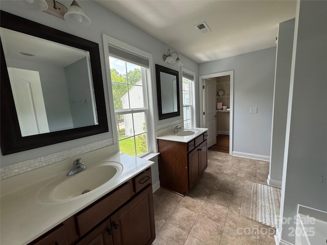 3500 Exbury Gardens Dr, Waxhaw, NC 28173 - full bath featuring two vanities and baseboards