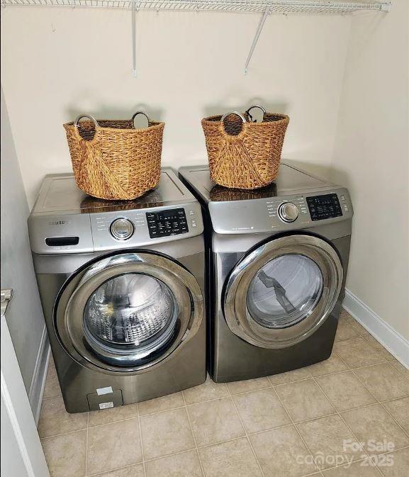 3500 Exbury Gardens Dr, Waxhaw, NC 28173 - laundry room with washer and dryer, tile patterned flooring, and baseboards