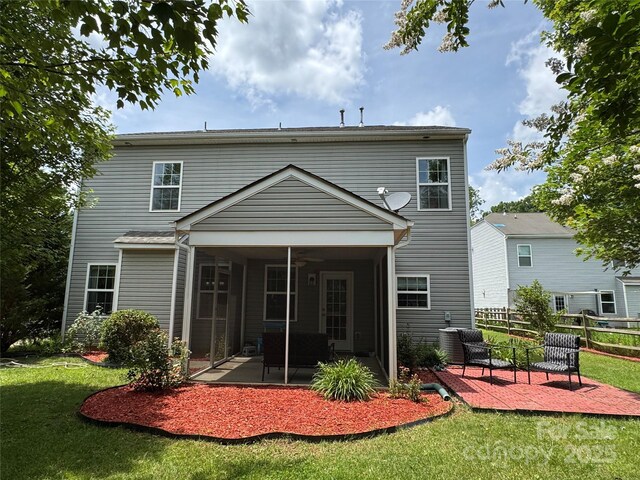 3500 Exbury Gardens Dr, Waxhaw, NC 28173 - rear view of house featuring a sunroom and a patio area