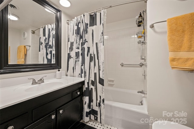 bathroom featuring shower / bath combo with shower curtain, toilet, and vanity