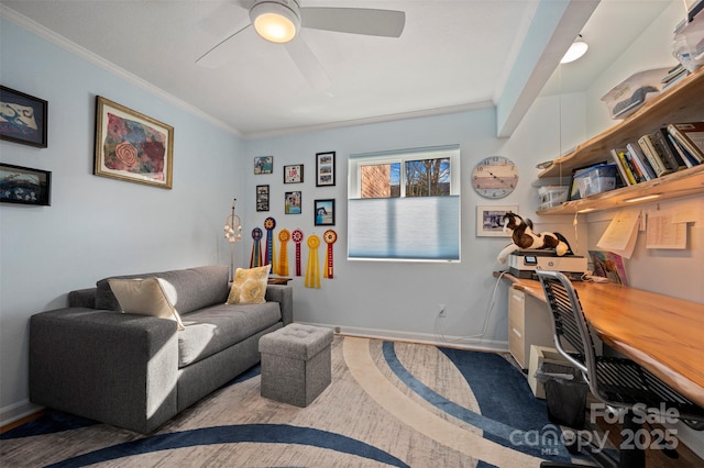 home office featuring baseboards, a ceiling fan, and ornamental molding