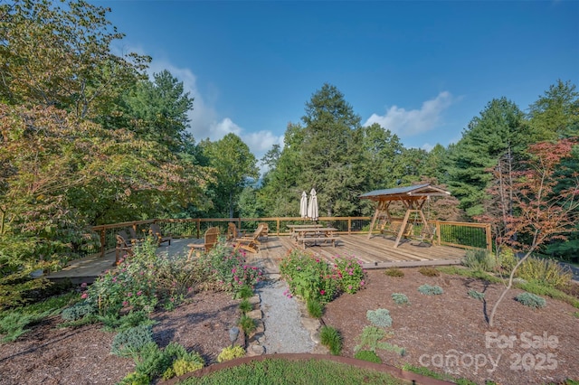 view of yard with a deck