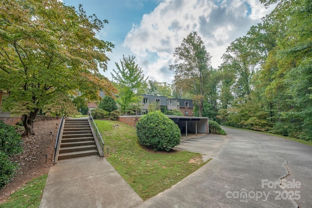 view of front of property with stairway