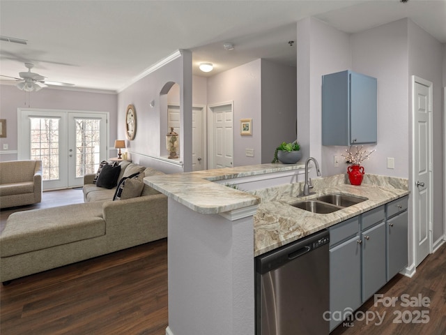 kitchen with visible vents, dark wood finished floors, a sink, dishwasher, and open floor plan