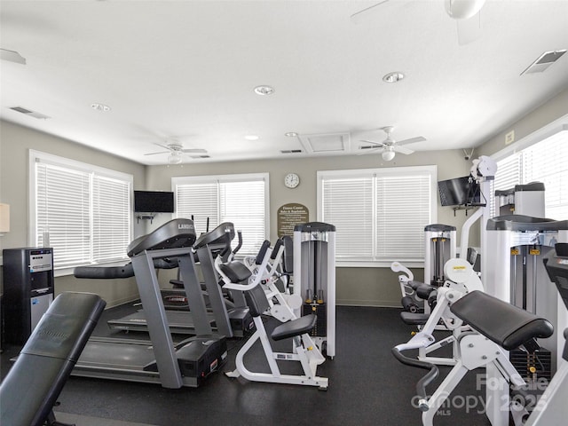 exercise room with visible vents, recessed lighting, baseboards, and a ceiling fan