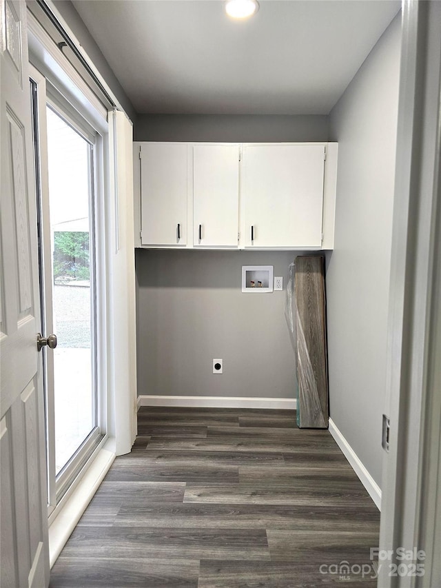 laundry area featuring dark wood-type flooring, washer hookup, cabinet space, baseboards, and hookup for an electric dryer