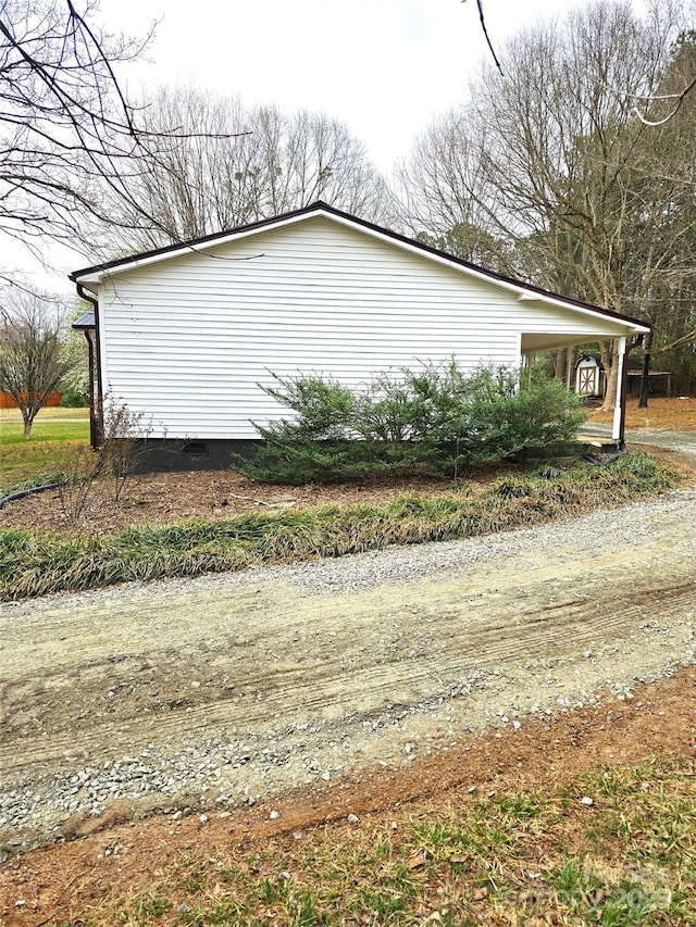 view of property exterior featuring crawl space