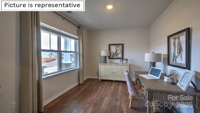 office space with wood finished floors and baseboards