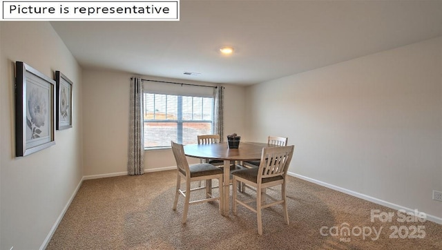 dining space featuring carpet flooring, visible vents, and baseboards