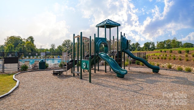 community play area featuring fence