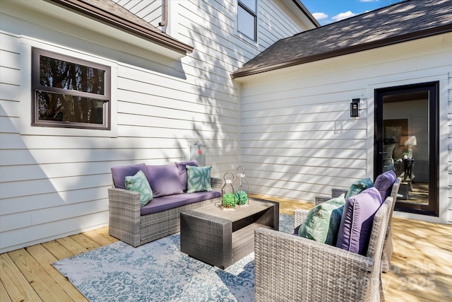 wooden terrace featuring outdoor lounge area