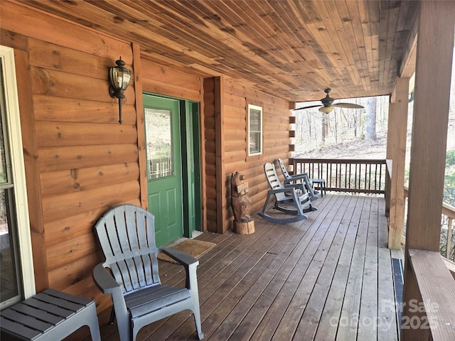 deck with a porch and ceiling fan