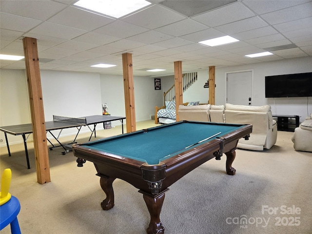 recreation room with a paneled ceiling, pool table, and carpet flooring