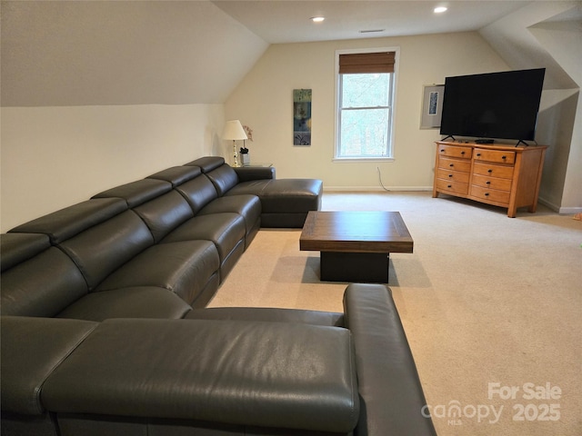 carpeted living room featuring vaulted ceiling, recessed lighting, and baseboards