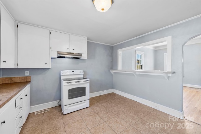 kitchen featuring crown molding, under cabinet range hood, arched walkways, white electric stove, and white cabinetry