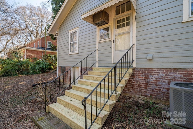 property entrance featuring central air condition unit