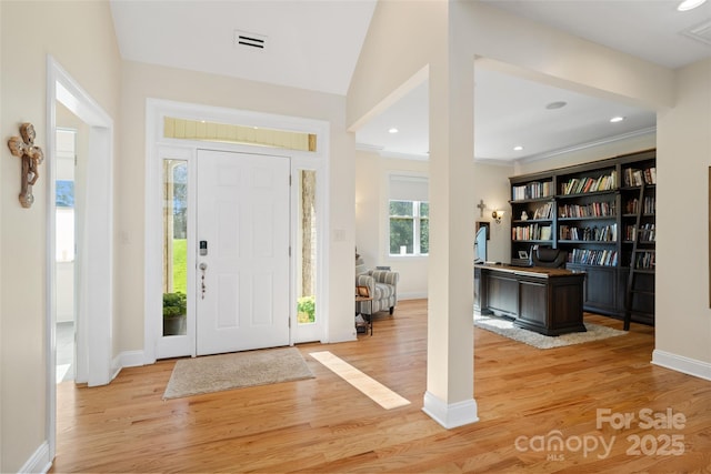 entryway featuring visible vents, recessed lighting, and light wood-style floors