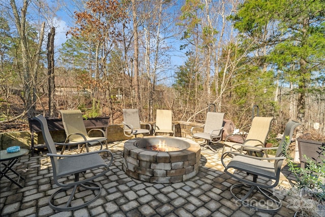 view of patio / terrace featuring a fire pit