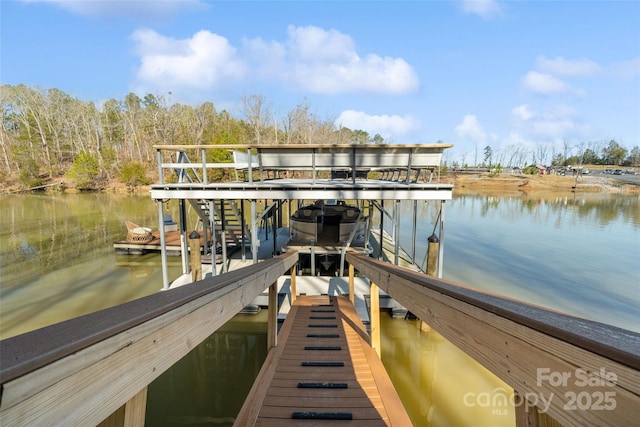 dock area featuring a water view and boat lift