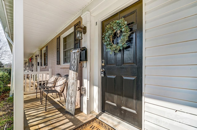 property entrance with a porch