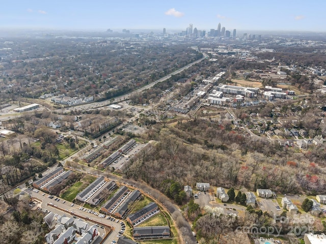 birds eye view of property featuring a city view