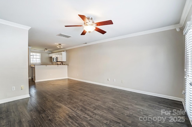 unfurnished living room featuring dark wood finished floors, visible vents, ceiling fan, and ornamental molding