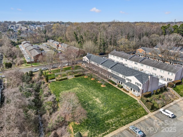aerial view featuring a forest view