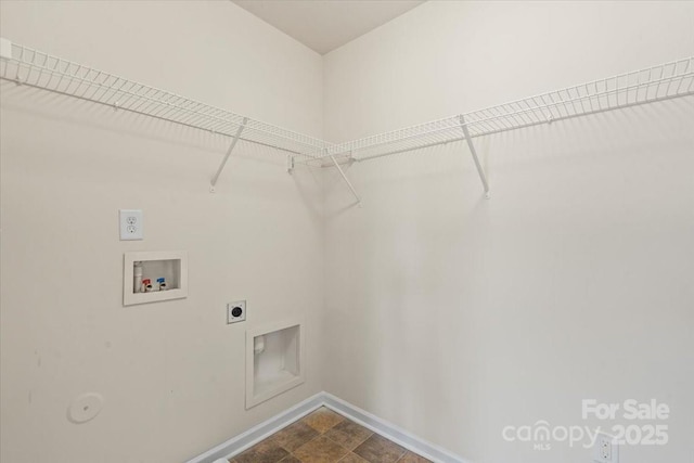 laundry area with washer hookup, laundry area, baseboards, and hookup for an electric dryer