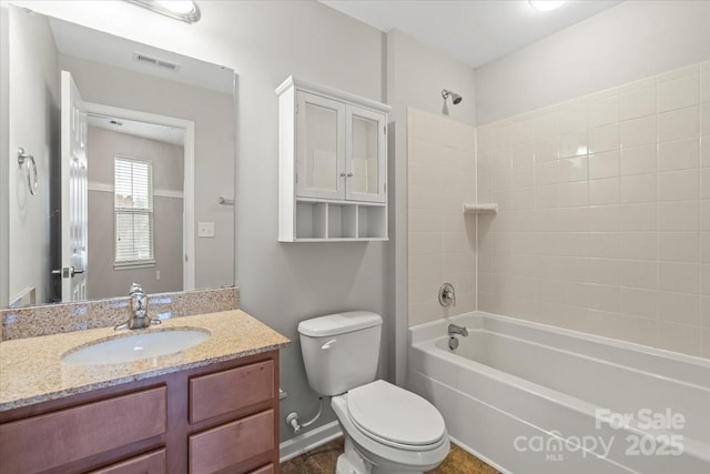 full bath featuring tub / shower combination, visible vents, toilet, and vanity