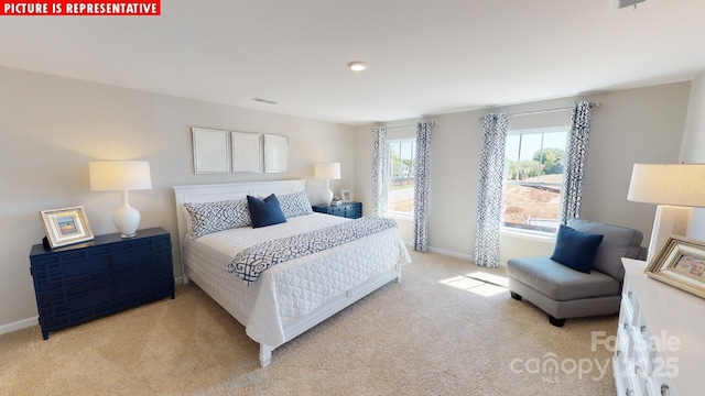 bedroom featuring carpet, visible vents, and baseboards